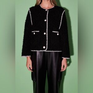 Black Teddy/Sherpa Jacket with cream whipstitch border